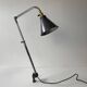 Old industrial wall light that is vintage.
