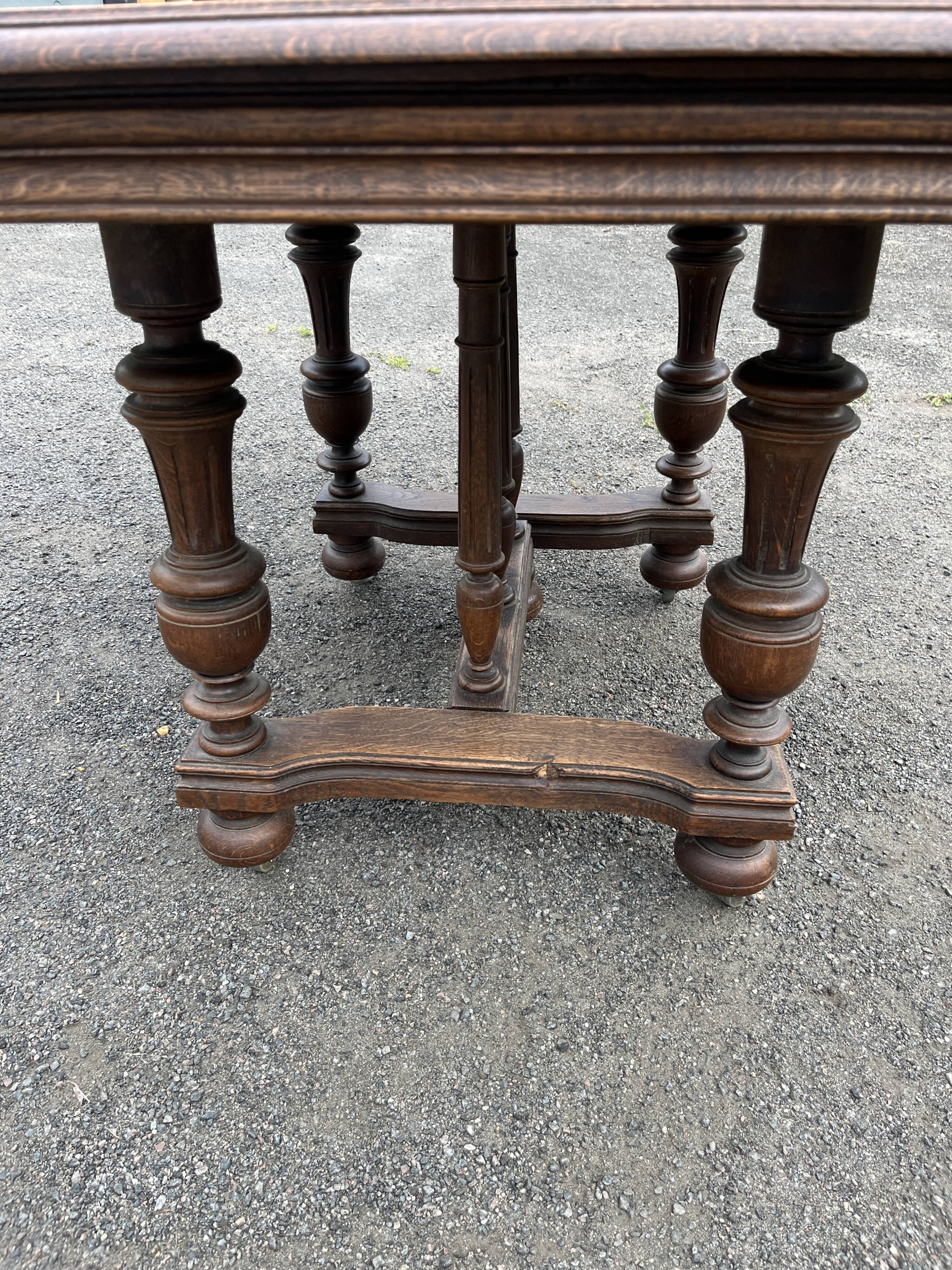 Henry II style oak dining table