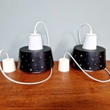 A pair of Scandinavian pendant lights in white opaline and black lacquered metal, 1960.