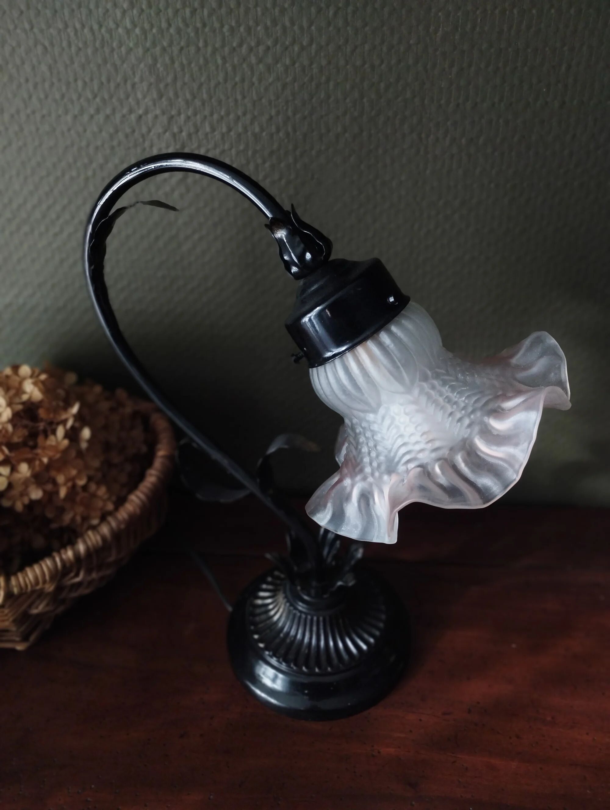 Tulip lamp in patinated black metal with an opaque glass shade.