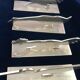 12 knife holders signed Yorel Art Deco