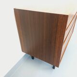 Vintage Scandinavian modernist chest of drawers in rosewood and black metal.
