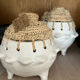 Pot en argile et raphia