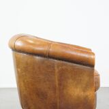 Fauteuil club en cuir de mouton patiné couleur cognac
