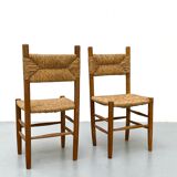 Pair of wooden chairs with seat and straw back