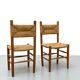 Pair of wooden chairs with seat and straw back