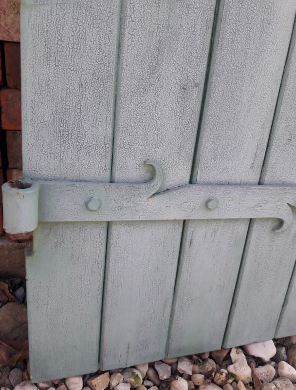 Pair of wooden iron hanging shutters