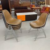 6 Herman Miller Eames stacking shell chairs with brown naugahyde pads