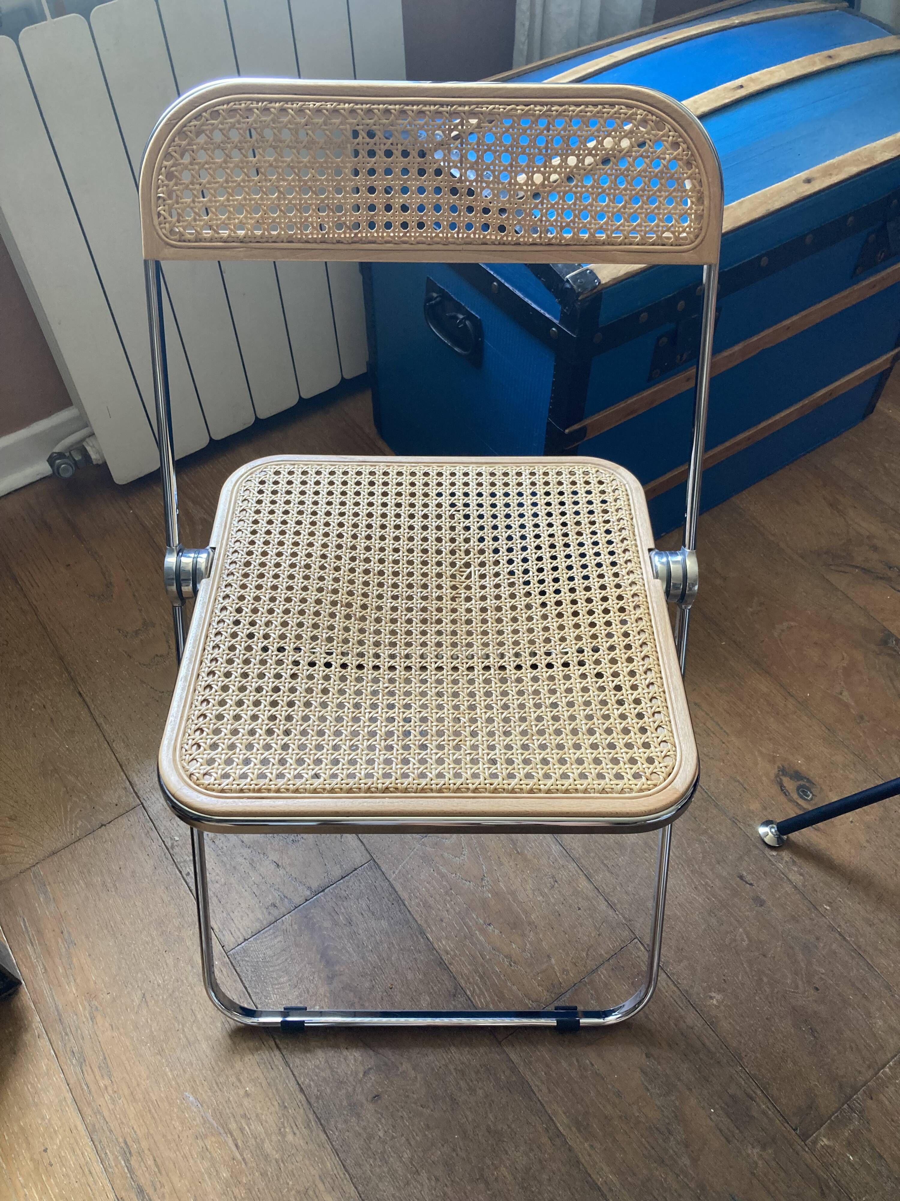 Plia chairs by Castelli in wood and cane.