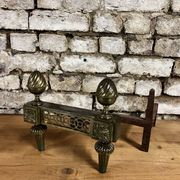 Pair of bronze andirons stamped bouhon frères in louis xvi style