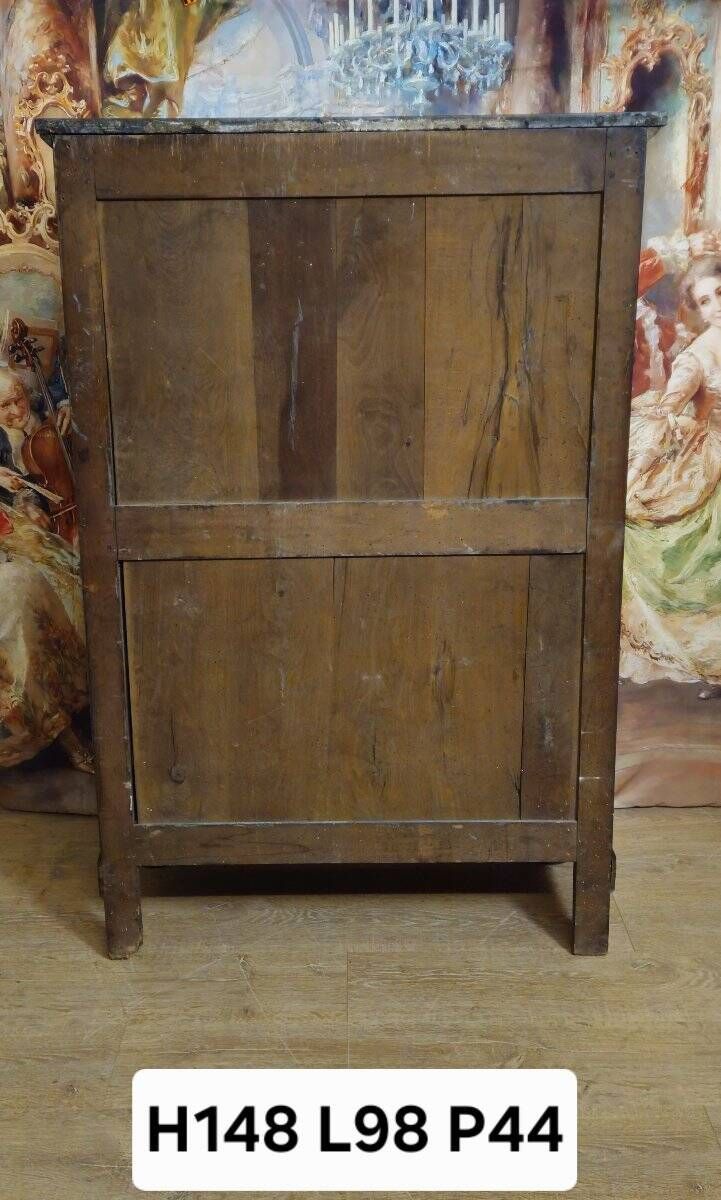 Empire period chest of drawers, early 19th century, in flame mahogany.