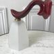 Art Deco glass wall lamp with burgundy porcelain support 30s