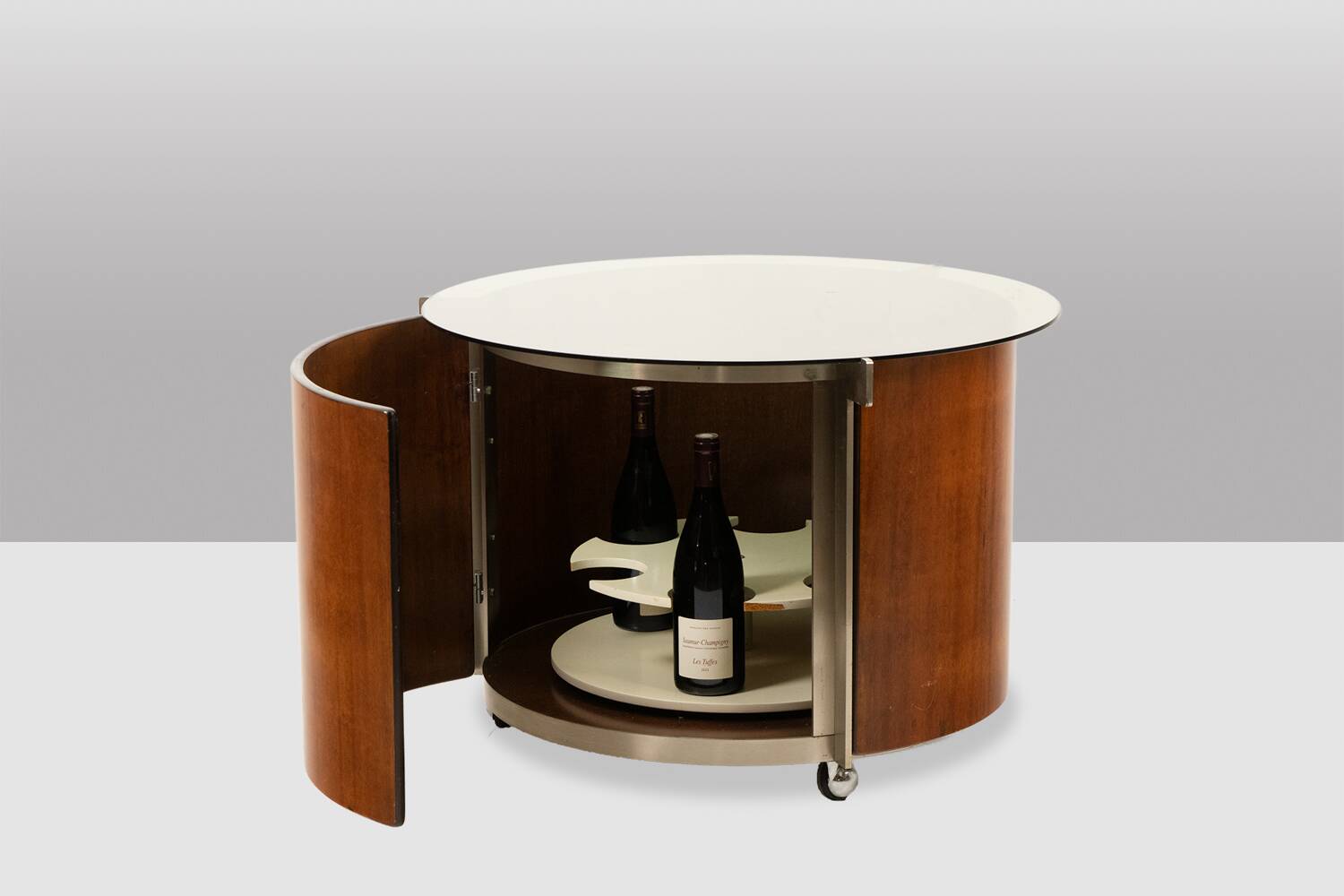 Eugenio Gerli, for Tecno. Round coffee table with integrated bar. Circa 1960.