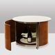 Eugenio Gerli, for Tecno. Round coffee table with integrated bar. Circa 1960.