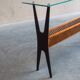 1950s Italian ebonized console table with glass top & lattice basket