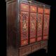 China 19th century: Red lacquer cabinet with gilding from the Qing Dynasty.