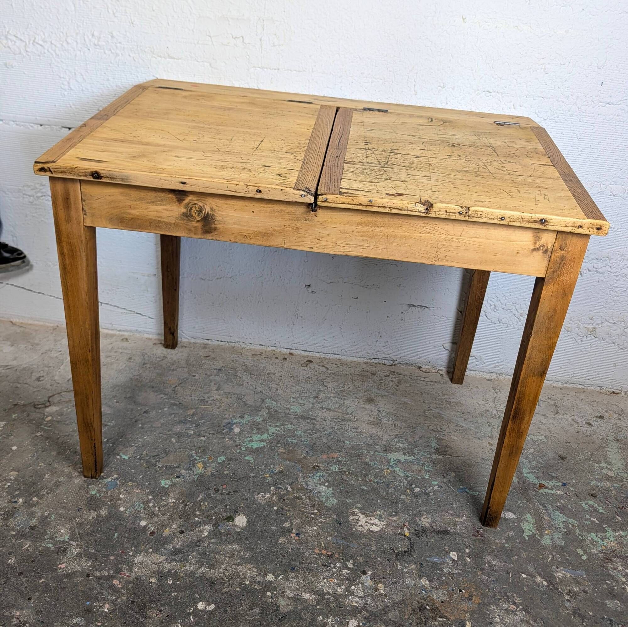 Antique wooden school desk with double lift-up tops.