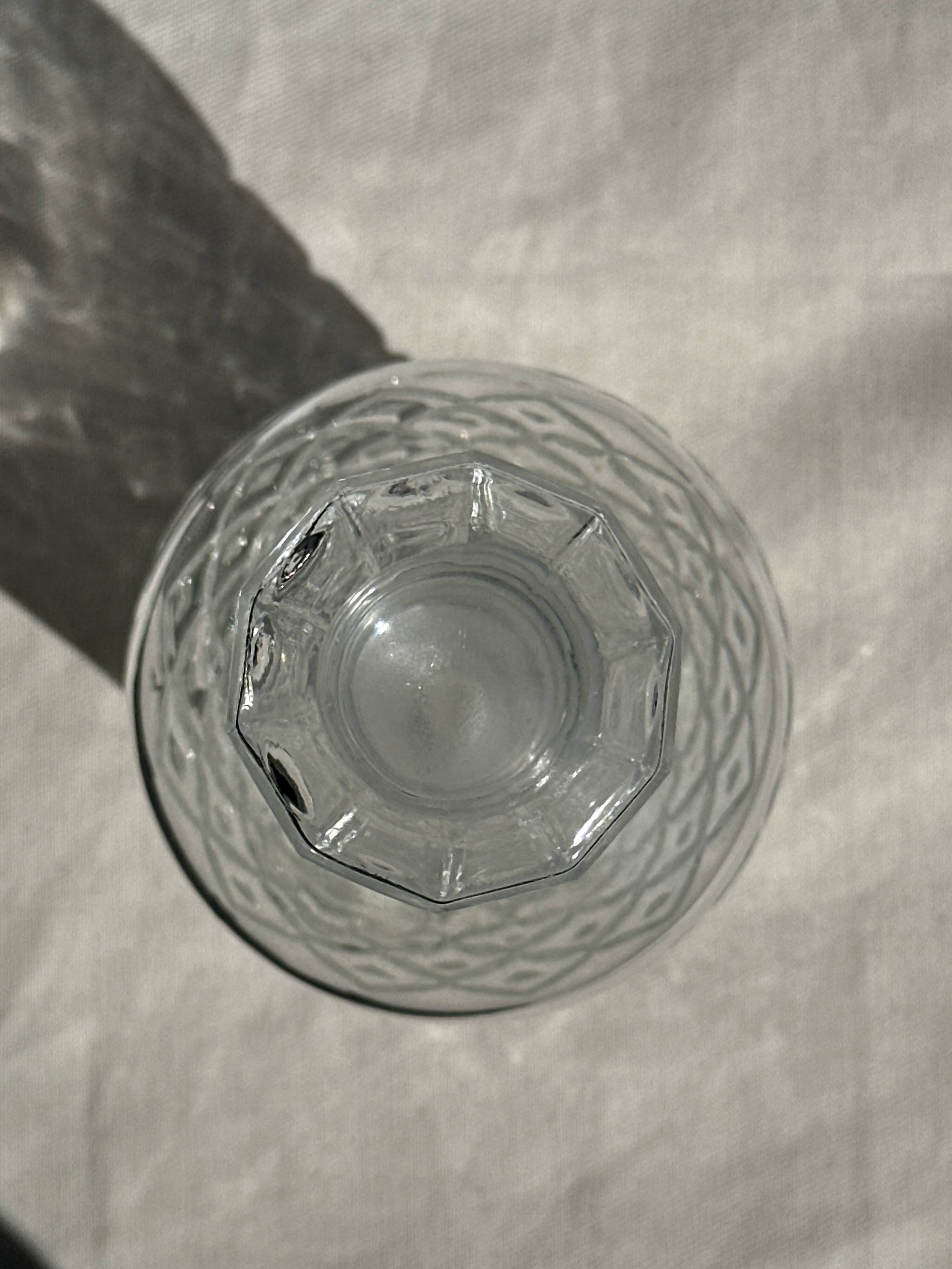 Small cylindrical glass whiskey decanter H:23