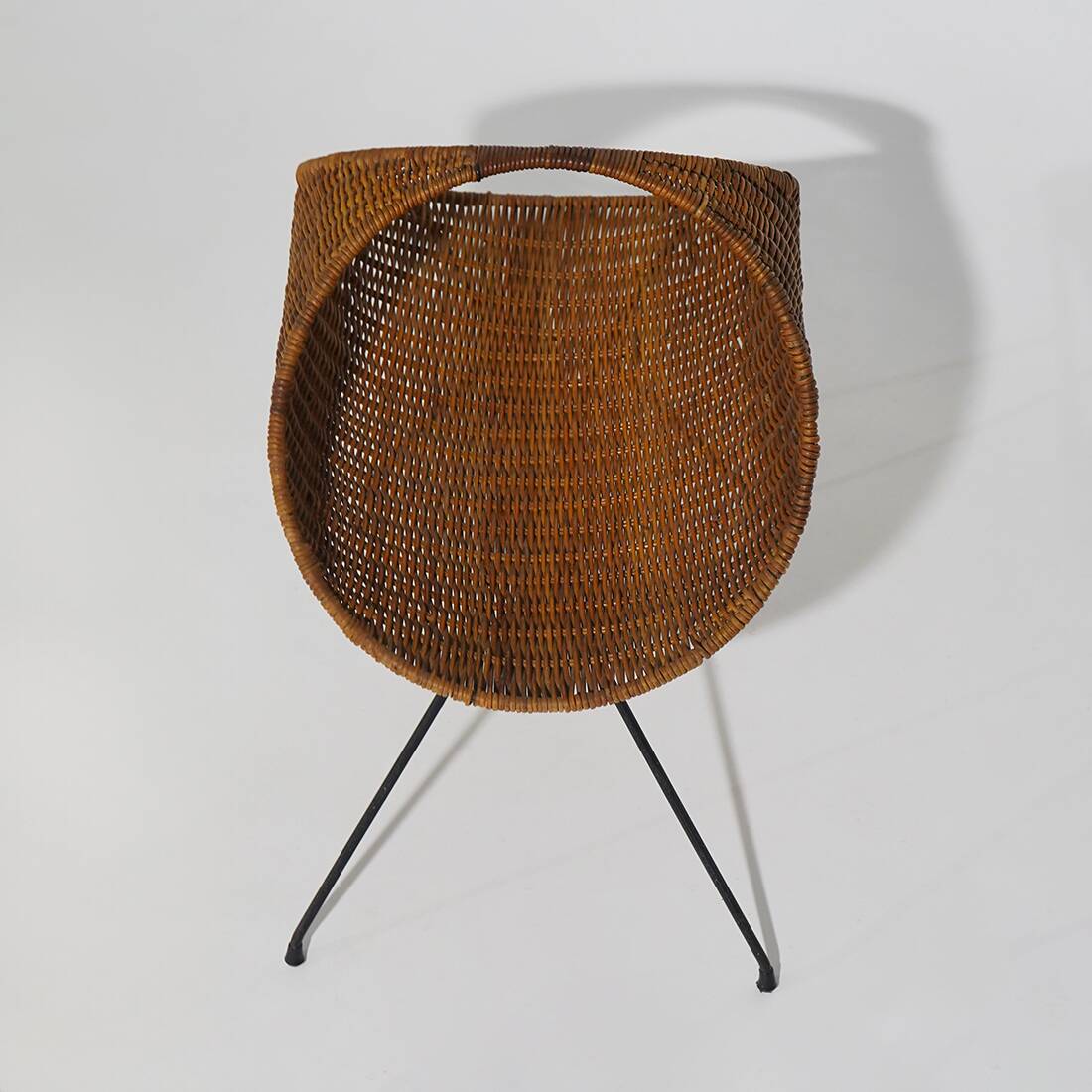 Rattan magazine rack with metal legs, 1950s
