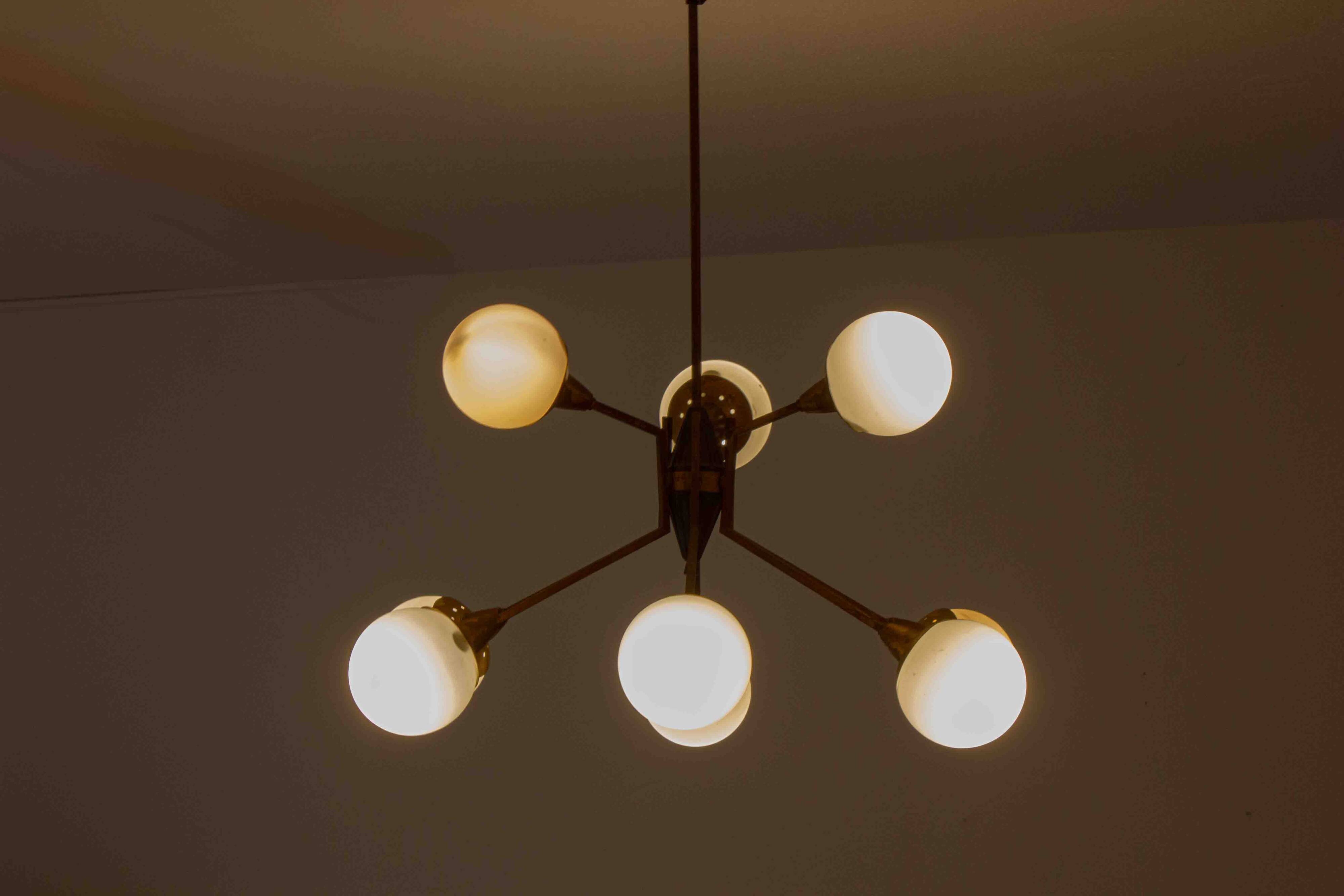 Impressive brass chandelier with opaline globes, Italy 1960s