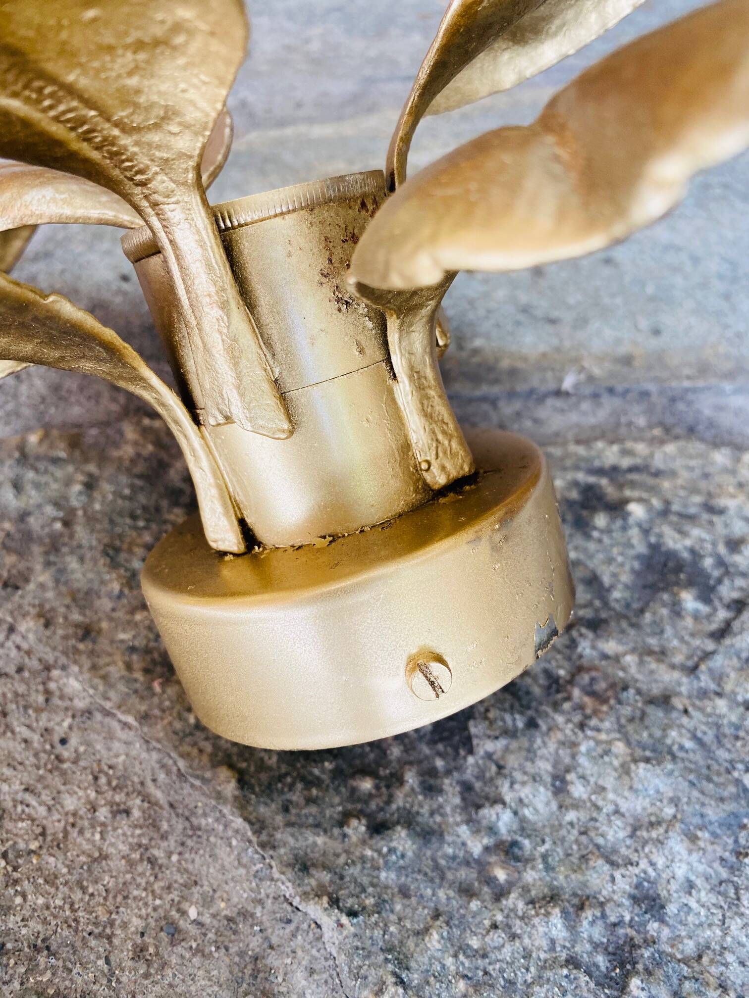 Gold metal flower wall light