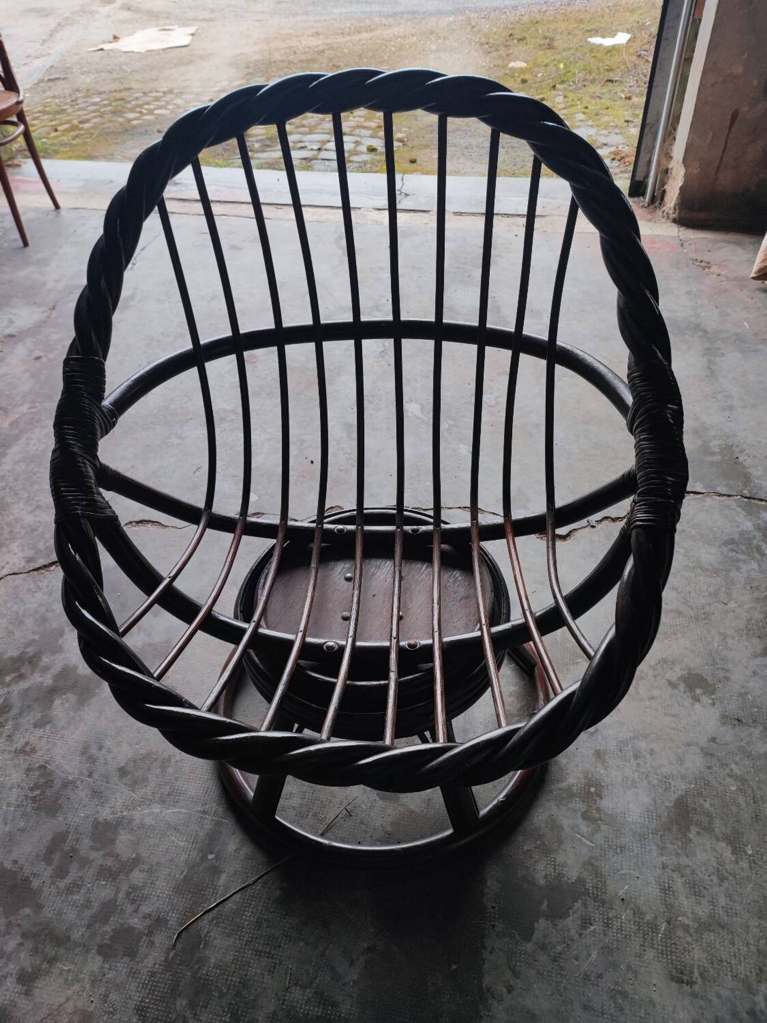 Swivel rattan love seat