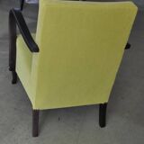 Art Deco armchair in chartreuse green and black wood, fabric upholstery, 1920s.