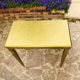 Coffee table in gilded wood