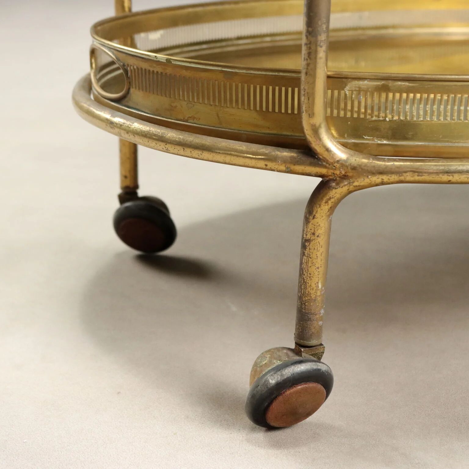 Vintage double-tier brass serving trolley, 1950s design.