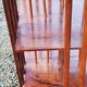 Art Deco style revolving bookcase in walnut and oak