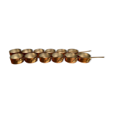 Suite de 12 casseroles en cuivre étamé