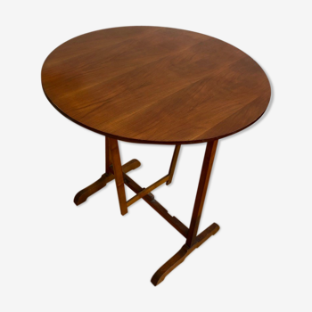 A folding table in cherry tree called a winemaker