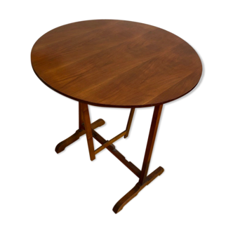 A folding table in cherry tree called a winemaker