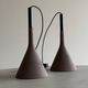A pair of Aplomb concrete pendants by Lucidi & Pevere for Foscari.