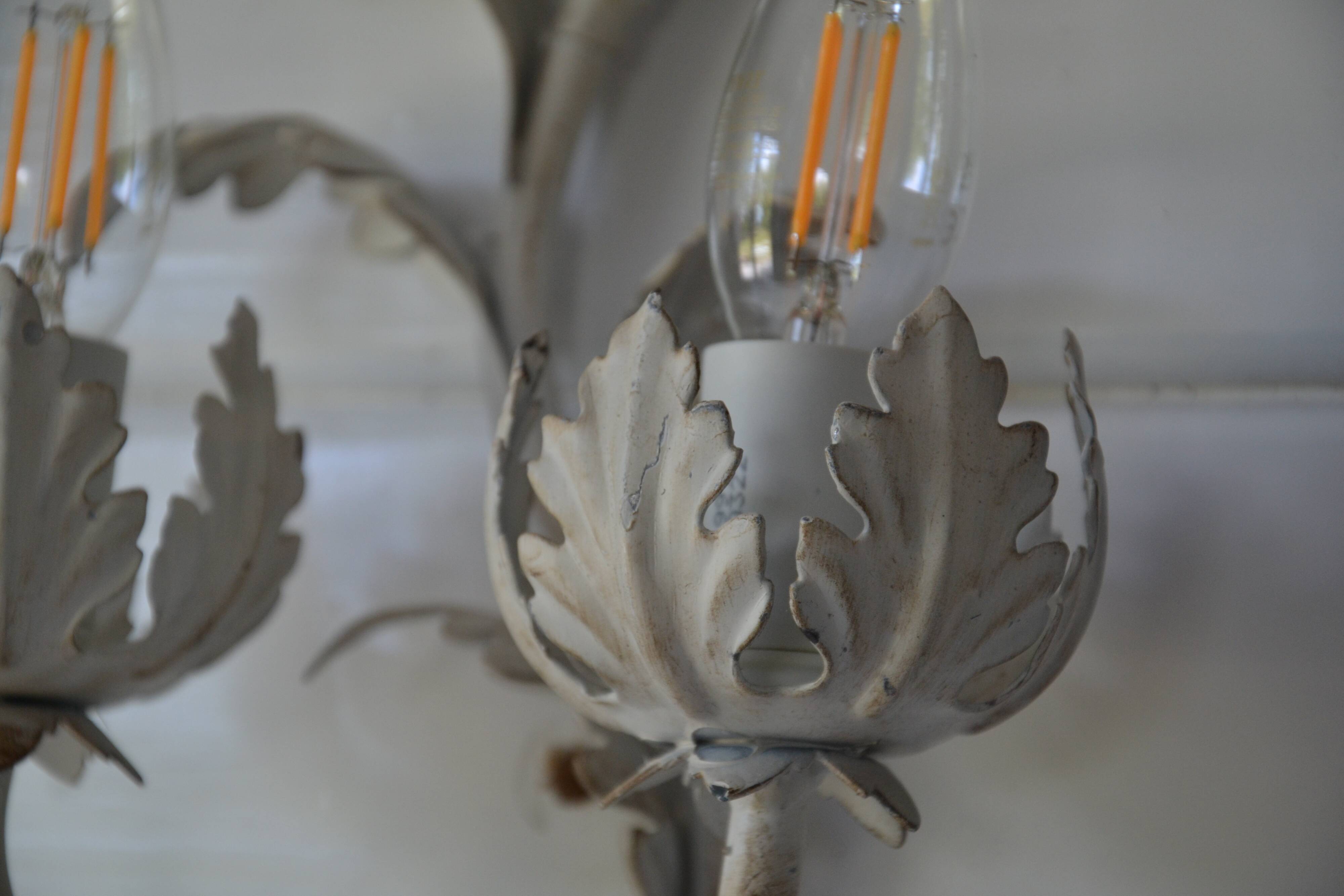 2 Florentine metal leaf wall lights