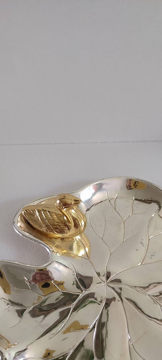 A Lancel pocket tray in silver metal.