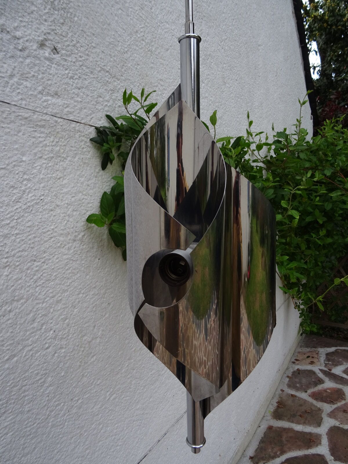 Hanging space age stainless steel