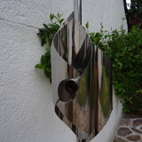 Hanging space age stainless steel