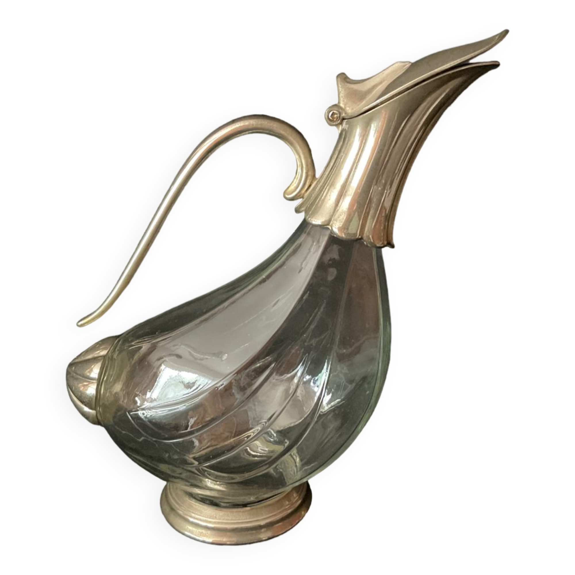 Glass decanter and silver metal duck