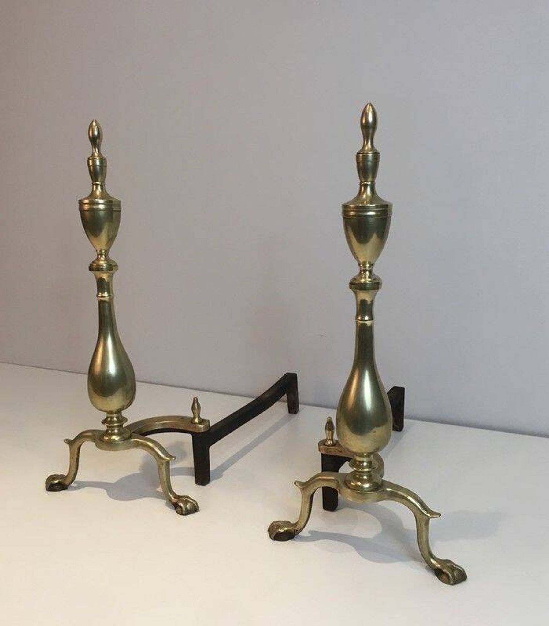Pair of neo-Gothic bronze and wrought iron andirons
