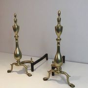 Pair of neo-Gothic bronze and wrought iron andirons