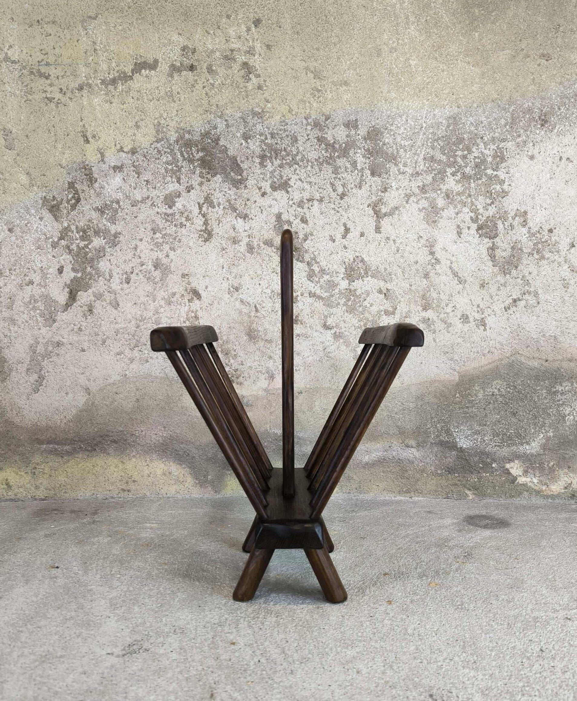 Vintage magazine rack in solid wood.