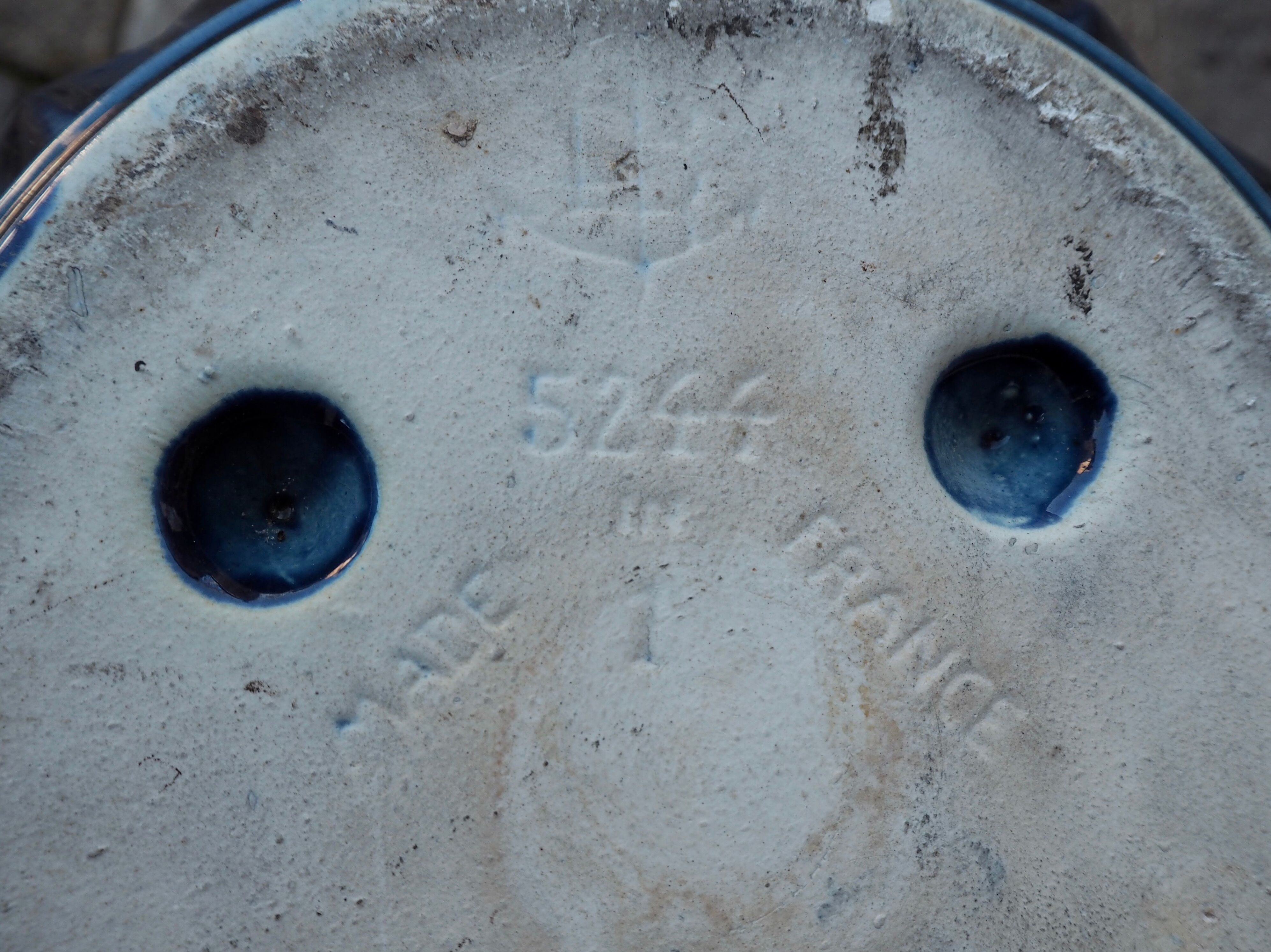 Blue ceramic pot cover