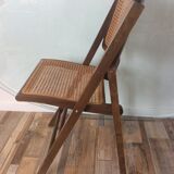 Folding chair caned from the 70s