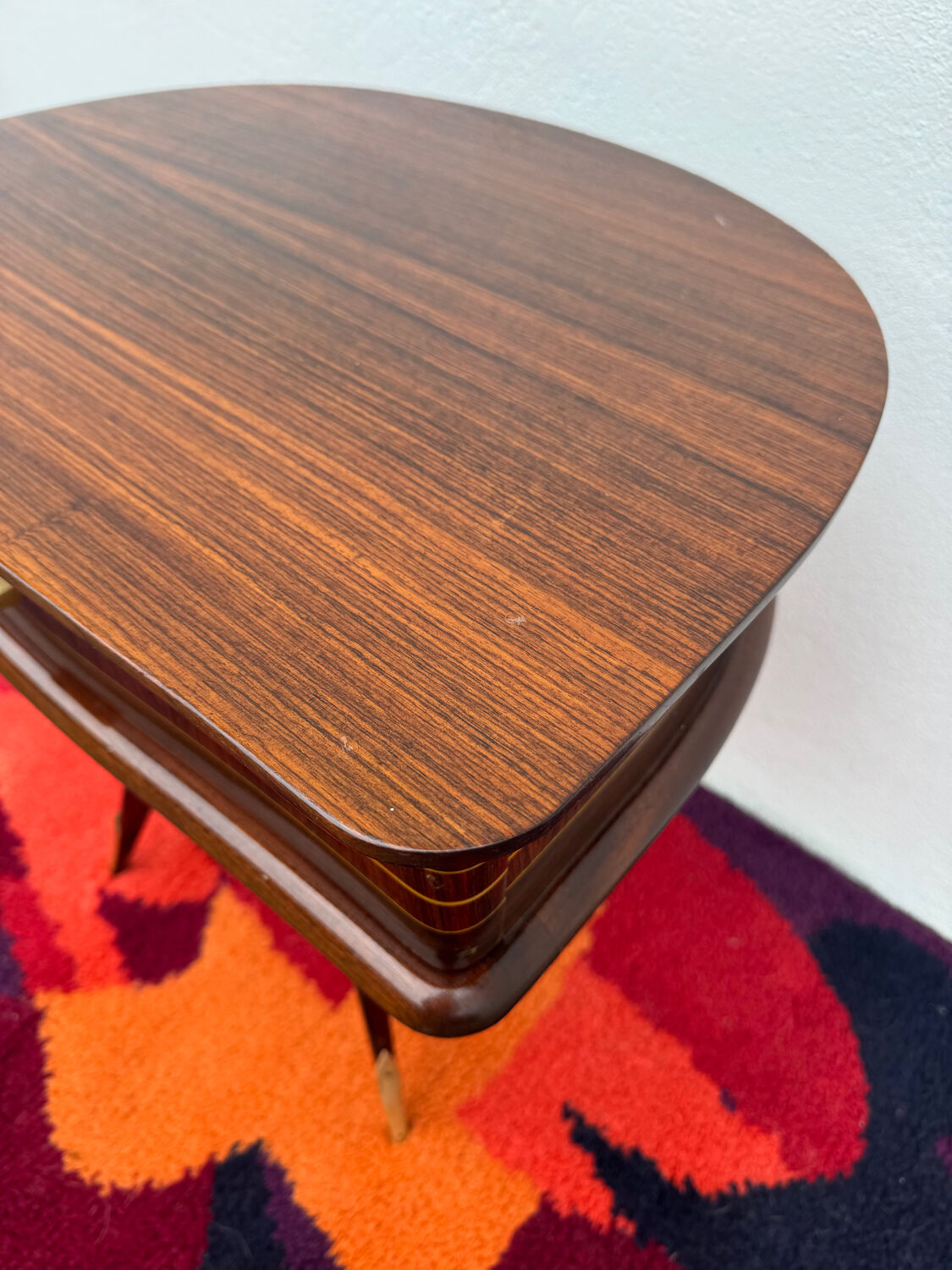 1950s half-moon tripod bedside table