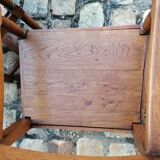 Pair of vintage oak armchairs with geometric design.