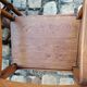 Pair of vintage oak armchairs with geometric design.