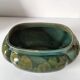 Art Deco flared cache-pot in turquoise glazed earthenware.