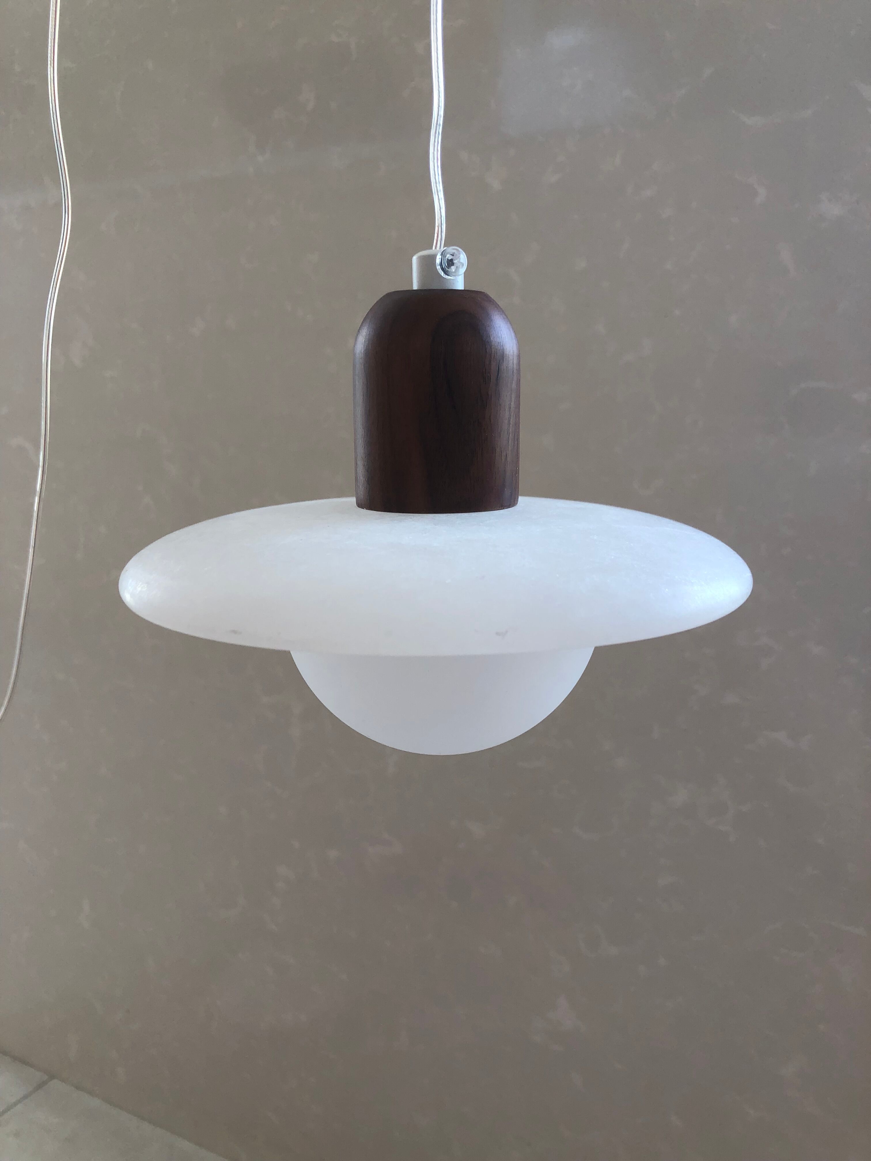 Pair of onyx and walnut suspended light fixtures