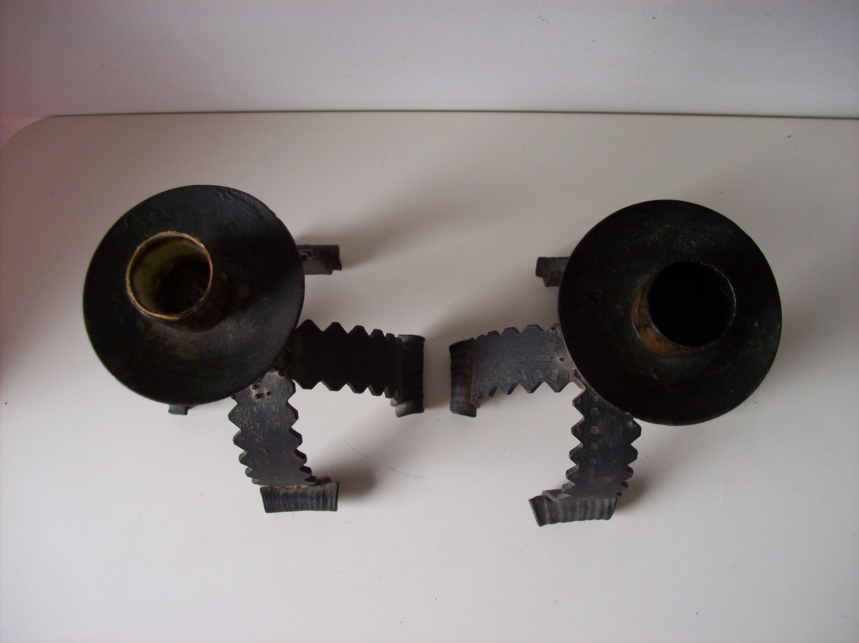 Pair of metal candlesticks